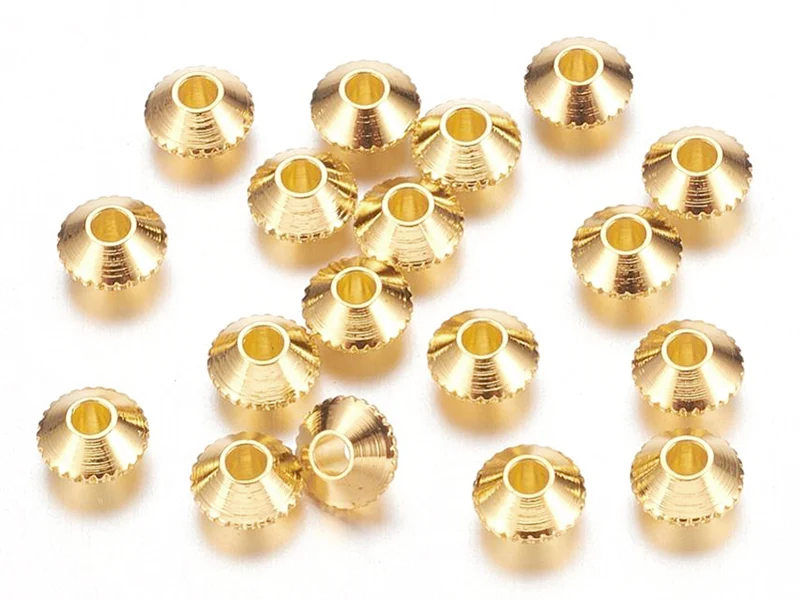20 perles rondelles toupies ciselées en laiton doré - 4 mm