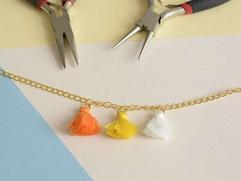 Pendentif pompon - jaune